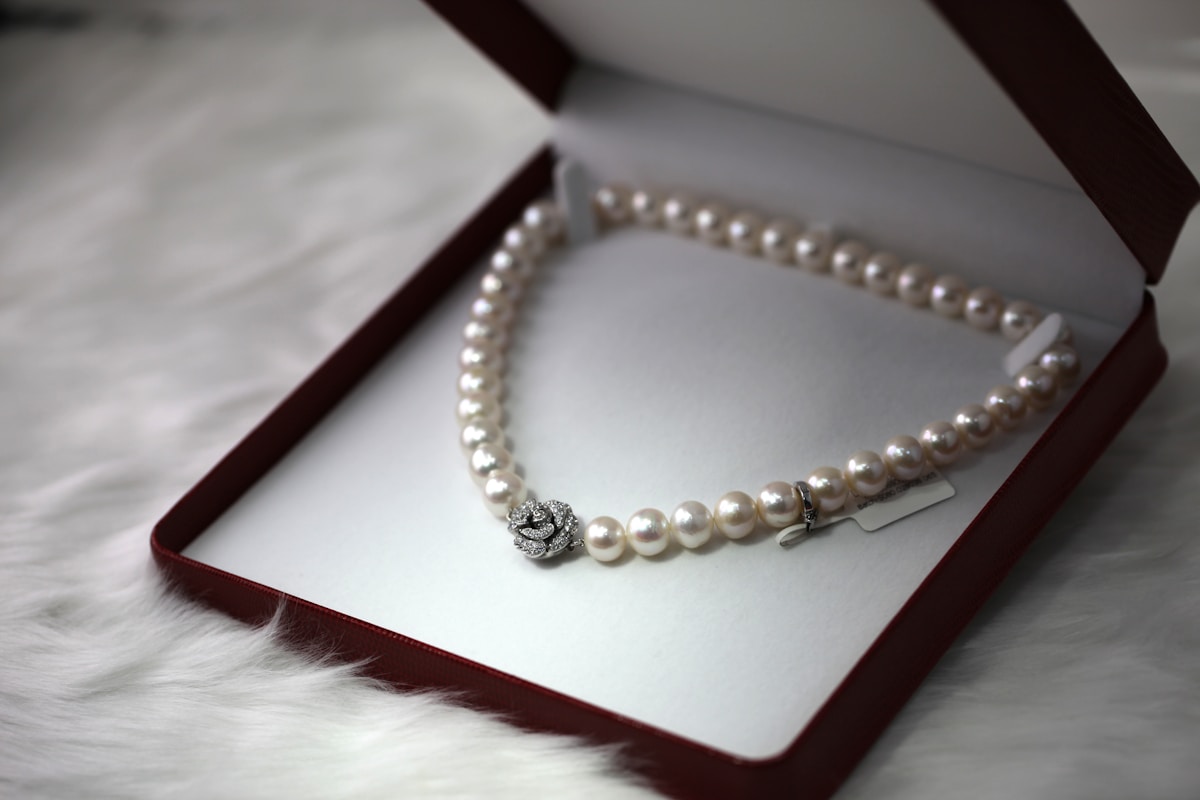 Antique and gold jewellery arranged for a UK valuation
