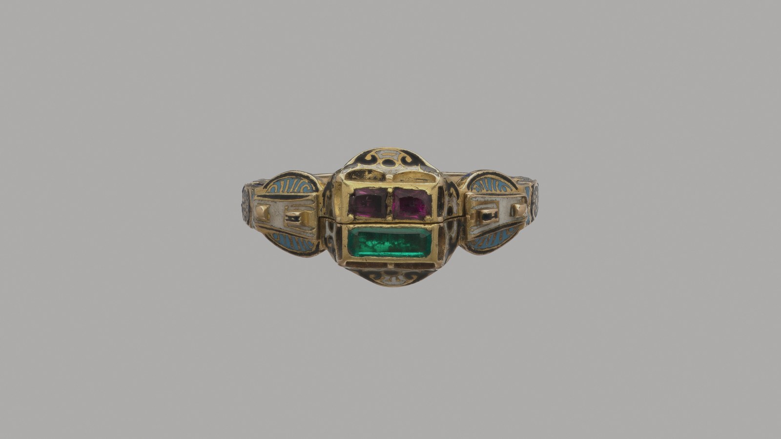 16th-century gold gimmel ring with enamel, rubies and an emerald