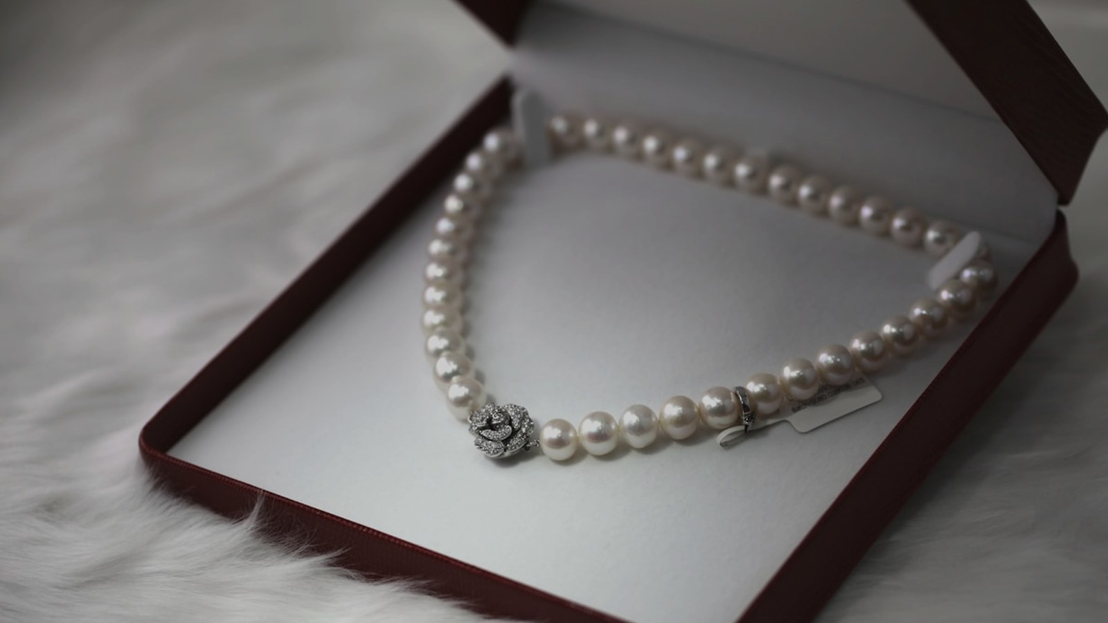 Pearl necklace in an open jewellery box