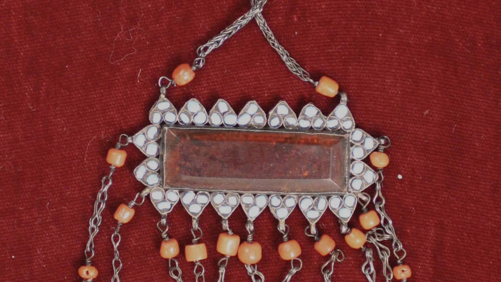 19th-century silver pendant set with coral, amber and turquoise