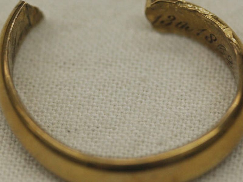 Worn gold wedding ring from 1862, engraved inside the band